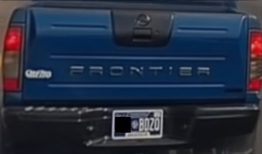 Rear license plate of a pickup truck — enhanced